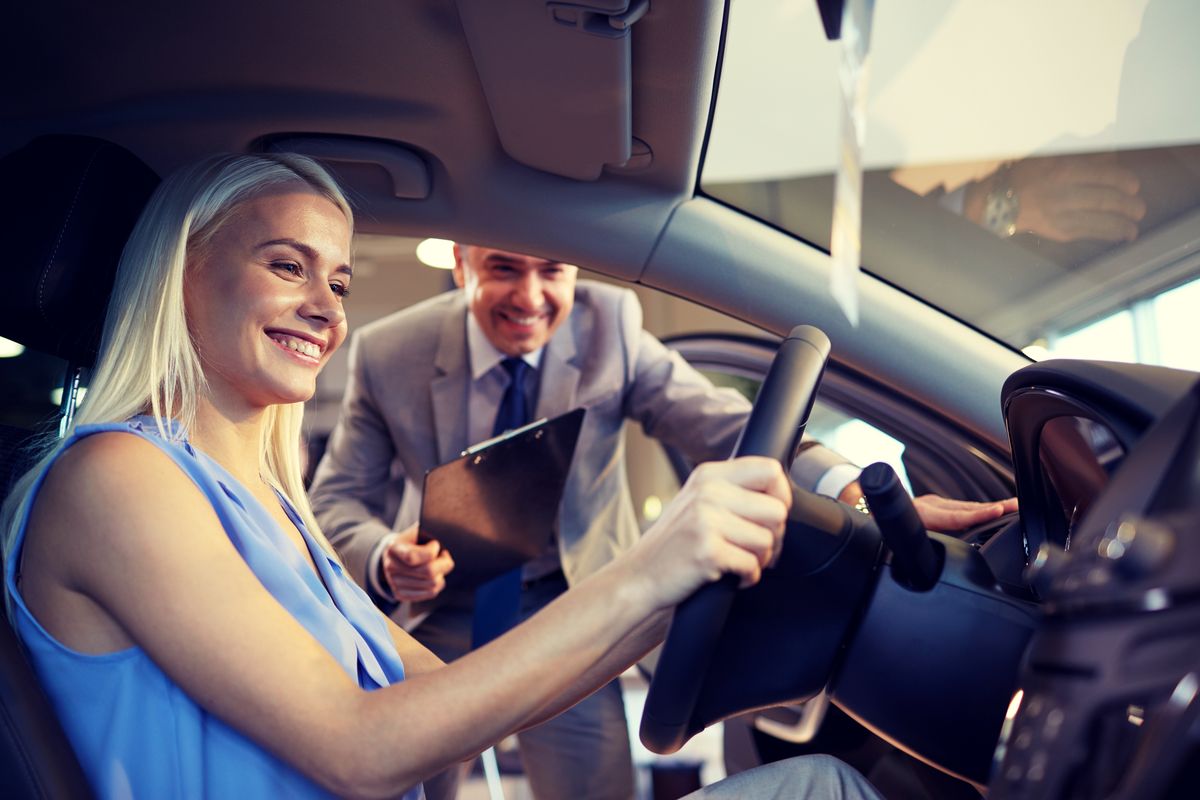 Handing vehicle keys to a client